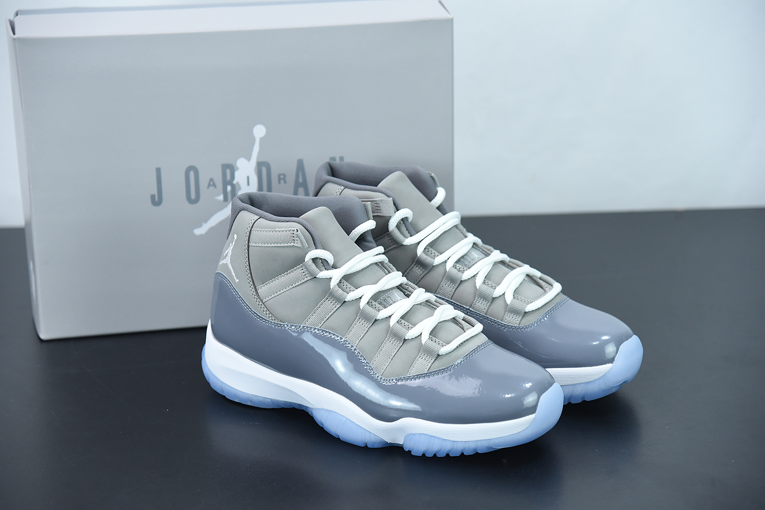 grey and white jordan 11