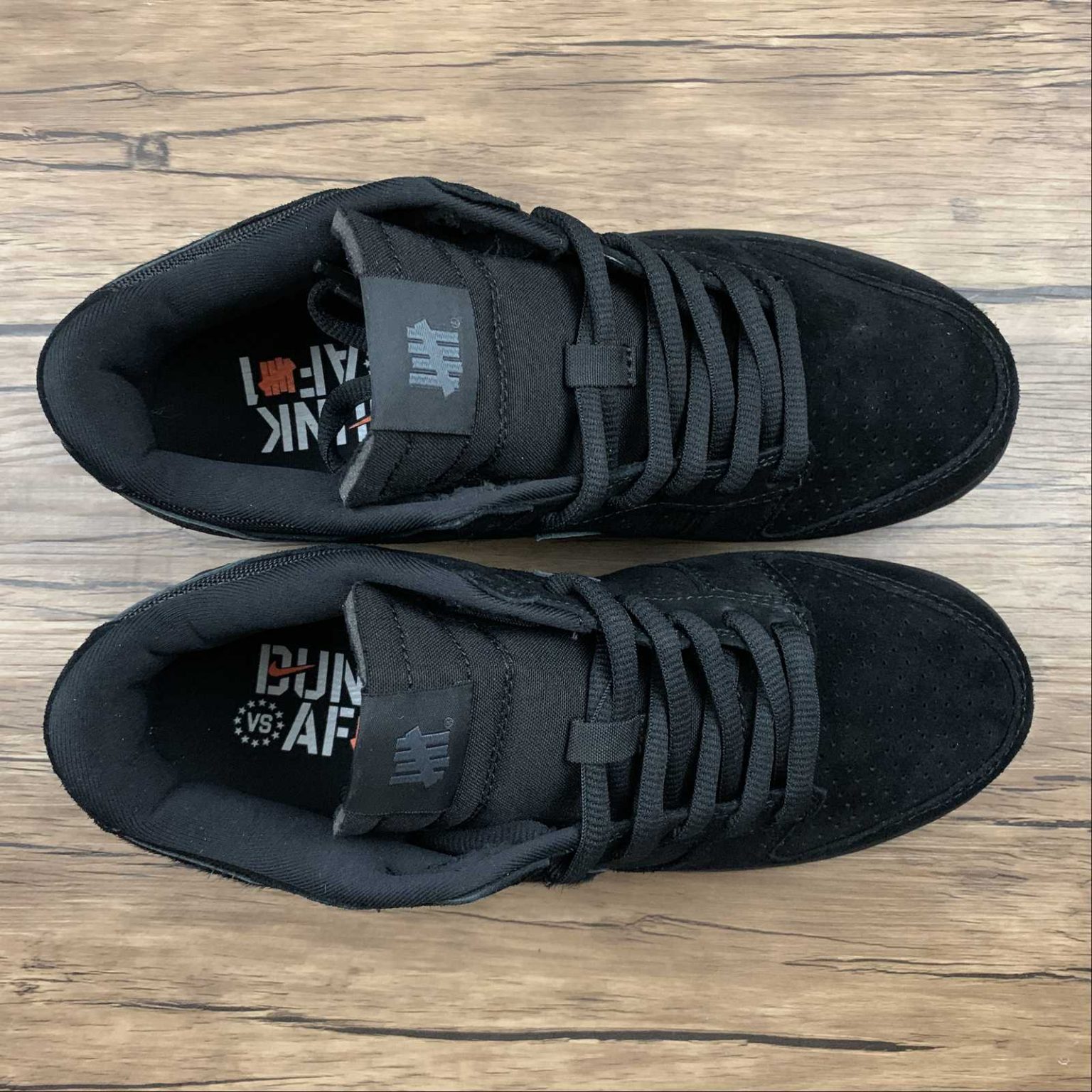 black undefeated dunk